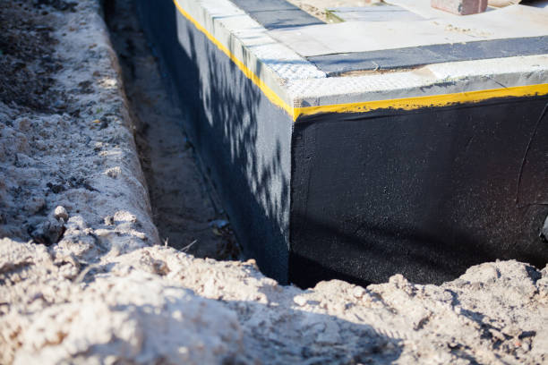 Professional Waterproofing technician working in Lincoln, IL